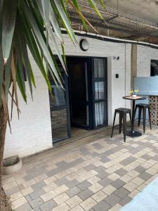 En balkon eller terrasse på The Nook at Maboneng -24hr security, WiFi, cozy home