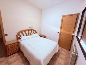 Postel nebo postele na pokoji v ubytování Hostal Castilla