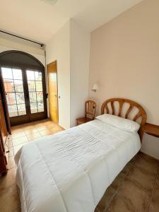 Postel nebo postele na pokoji v ubytování Hostal Castilla