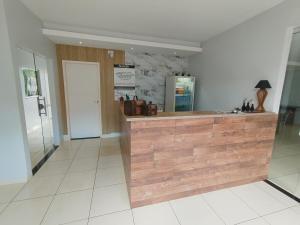 Η κουζίνα ή μικρή κουζίνα στο Suíte Privativa no Residencial Vitória - 3