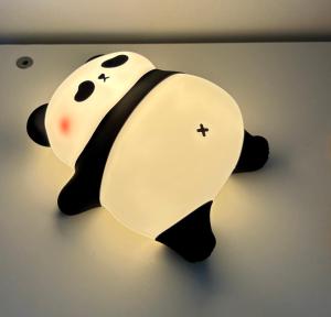 a panda bear shaped light on a wall at Panda's Patch Dunsborough in Dunsborough