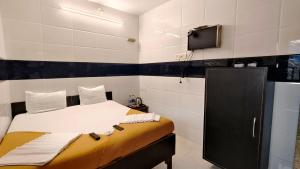 Kuchyň nebo kuchyňský kout v ubytování Hotel Kamal - Mumbai Hotels
