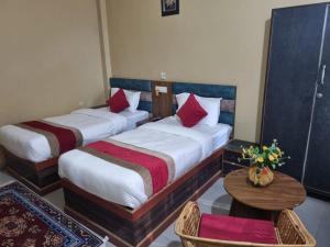Postel nebo postele na pokoji v ubytování Hotel K I