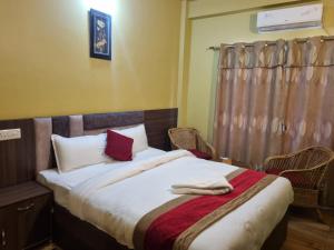 Postel nebo postele na pokoji v ubytování Hotel K I
