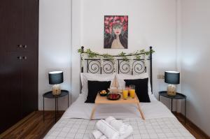 Ένα ή περισσότερα κρεβάτια σε δωμάτιο στο Cocomelo apts 3 luxury