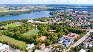 an aerial view of a city and a river at Apartament Klonova z tarasem in Olecko