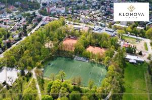 an aerial view of a park with a soccer field at Apartament Klonova z tarasem in Olecko