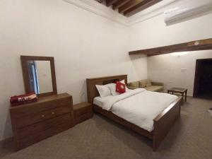 Ein Bett oder Betten in einem Zimmer der Unterkunft Hyba Heritage Guest House