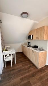 Kuchyňa alebo kuchynka v ubytovaní Pilger Apartments