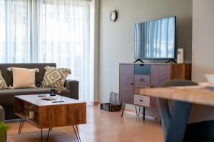 O zonă de relaxare la Vasmir Apartment