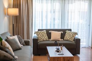 O zonă de relaxare la Vasmir Apartment