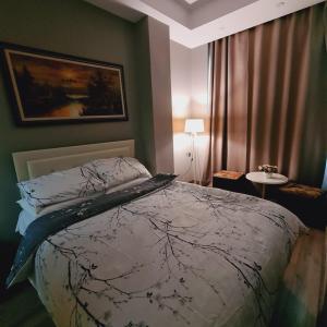 Postel nebo postele na pokoji v ubytování Driti Hotel & Apartments + 9 fotografií