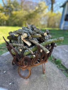 a basket full of coils of rope on a table at Oak View Lodge: Cosy, Countryside Retreat in Maybole