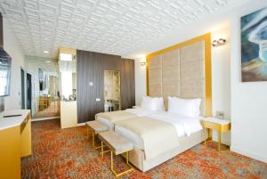 Voodi või voodid majutusasutuse Carat Hotel Yerevan toas