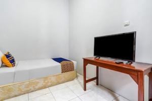 TV o dispositivi per l'intrattenimento presso Hotel O Dago Near Bandung Zoo Formerly Chatter Place