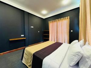 Letto o letti in una camera di Cloudscape Breeze