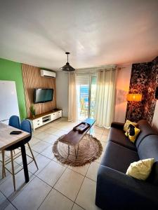 TV/trung tâm giải trí tại Résidence tropicale