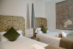 Postel nebo postele na pokoji v ubytování L'Ocean Penthouse Banus