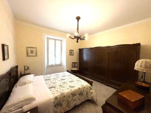 Posteľ alebo postele v izbe v ubytovaní Appartamenti a Pitigliano
