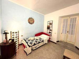 Posteľ alebo postele v izbe v ubytovaní Appartamenti a Pitigliano