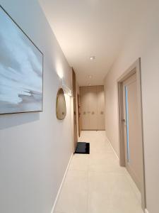 Μια τηλεόραση ή/και κέντρο ψυχαγωγίας στο Apartament Uzdrowiskowy HYGGE GJ II +7 φωτογραφίες
