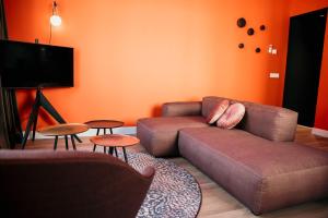 TV a/nebo společenská místnost v ubytování Fortuna Suites