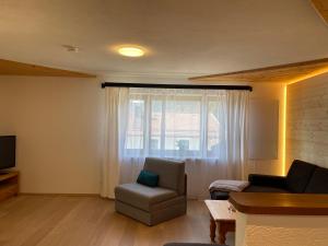 Posezení v ubytování Großzügige Ferienwohnung Gimpl Kathi mit Bergblick