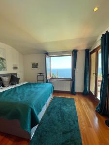 Postel nebo postele na pokoji v ubytování VILLA LOVRAN - 150m to the beach - infinity pool - incredible sea view - fitness room