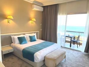 Postel nebo postele na pokoji v ubytování Hotel Méditerranée Beyrouth + 37 fotografií