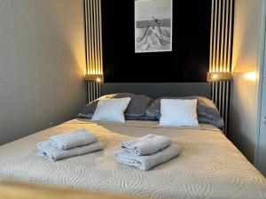 Postel nebo postele na pokoji v ubytování rishko resort