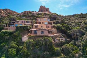 an aerial view of a house on a mountain at Casa Paradiso Guest House in Costa Paradiso