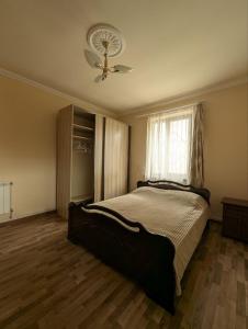 Postel nebo postele na pokoji v ubytování Rima's house Jervezh