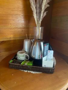 a tray with a blender and other items on a table at Inap Desa Abang adik in Kampong Dalong