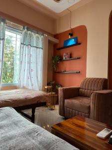 Una cama o camas en una habitación de lux flat 401 Ratnagiri