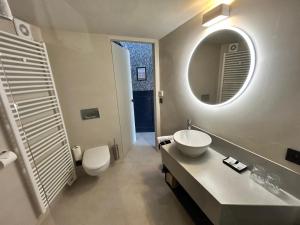 Uma casa de banho em B&B Contrast
