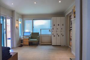 TV o dispositivi per l'intrattenimento presso Helloworld guesthouse