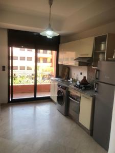 Η κουζίνα ή μικρή κουζίνα στο - Résidence Babylone Y - 1 Bedroom Appartement