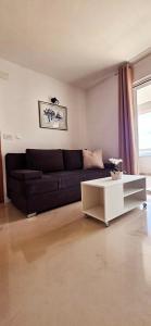 Posezení v ubytování APARTMENTS LUMA 1