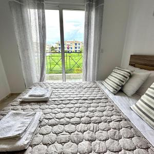 Postel nebo postele na pokoji v ubytování R&T Apartments
