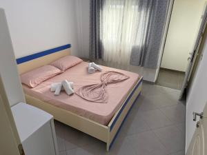 Postel nebo postele na pokoji v ubytování Namelijan's Hotel