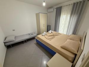 Postel nebo postele na pokoji v ubytování Namelijan's Hotel