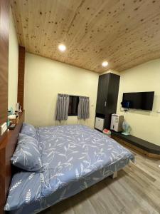 TV a/nebo společenská místnost v ubytování Sunshine Homestay