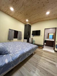 Postel nebo postele na pokoji v ubytování Sunshine Homestay