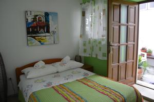 Posteľ alebo postele v izbe v ubytovaní Rooms Goga