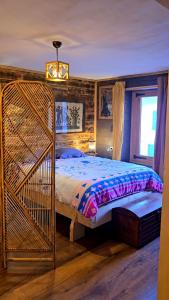 Postel nebo postele na pokoji v ubytování Grand gîte atypique