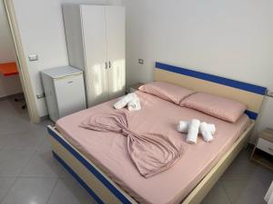 Postel nebo postele na pokoji v ubytování Namelijan's Hotel