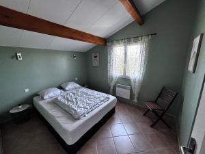 Postel nebo postele na pokoji v ubytování Villa Sérénitude