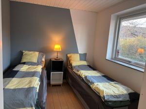 Postel nebo postele na pokoji v ubytování Home in Billund