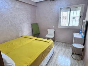 Postel nebo postele na pokoji v ubytování Beachfront apartment