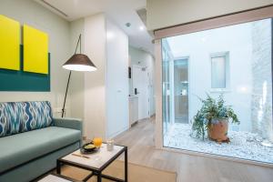 Χώρος καθιστικού στο Sercotel Sevilla Guadalquivir Suites